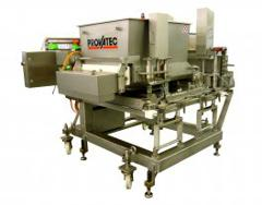 Food depositing system eliminates the need for hydraulic oil
