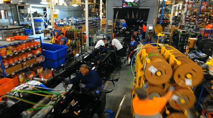 Daimler’s truck assembly plant includes 1,500 ft chassis assembly lines with more than 125 workstations on each.