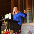 Emilie Peltre, Senior Principal Packaging Engineer for Abbott opens the Abbott Connected Health Challenge at the AIPIA World Congress.