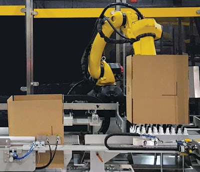 This bottom-load case packer forms the corrugated case around its cosmetic contents instead of pushing, pulling, or lifting the delicate, easily-damaged packs into a bottom-sealed case.