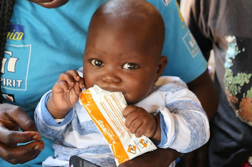 Just one box of Plumpy’Nut—containing 150 packets of a peanut-based high-energy therapeutic food that treats severe malnutrition—is enough to bring a child from the brink of death to healthy development.
