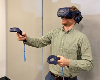A setup of a computer, hand devices, a headset, and a couple of sensors, can immerse trainees in an environment to practice.