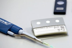 The complex structure of Roche’s cobas plasma separation card consists of a carrier layer with a bonded nonwoven fabric and an upper layer for protection and labeling.