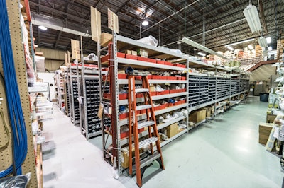 The spare parts area within the Taunton, MA facility includes millions of dollars of inventory which allows Harpak-ULMA to fill 90% of orders within 24 hours. For example, if a customer needs a specific part, they’ll have it in stock, so if it breaks or wears out, they have it ready for them. They also do light manufacturing here, enabling the OEM to make any part as they have six axis machining centers.