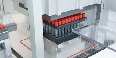 The OPTIMA BCT-200 assembly line manufactures and packages blood collection tubes. Additives are dispensed into the tubes, which are then vacuum sealed (picture).