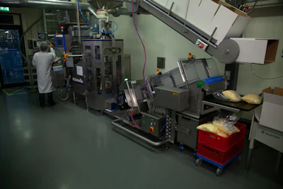 Jansen Control Systems designed each incline conveyor to be fully integrated with the Interceptor metal detector, vertical packing system, and peripheral equipment.