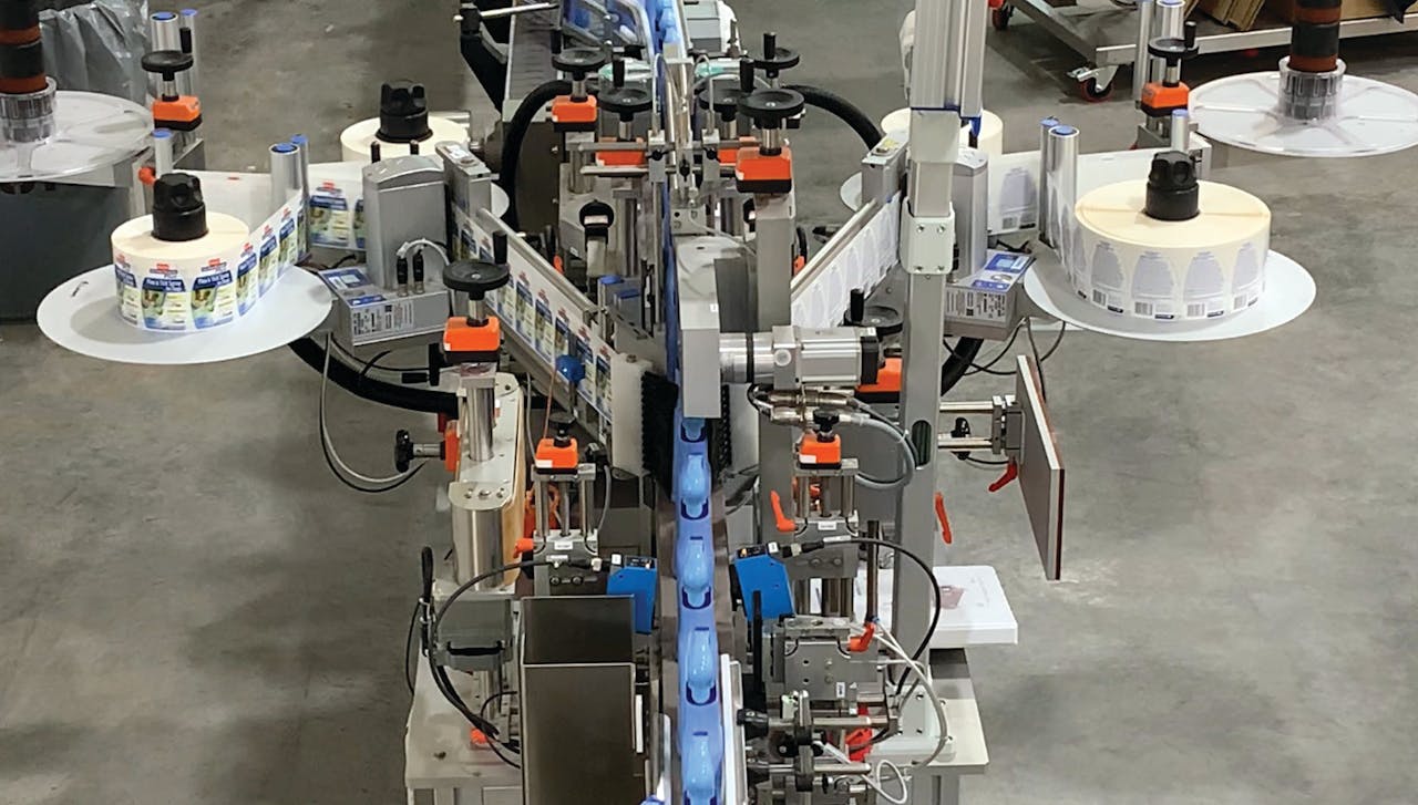 Dual-head labeler applies either wraparound or front-and-back labels.