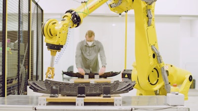 Operator load station application using FreeMove and Fanuc robot.
