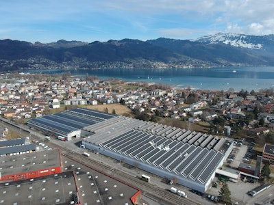 Company’s Switzerland facilities are now fully powered by renewable electricity via hydroelectric power and an extensive new solar plant.