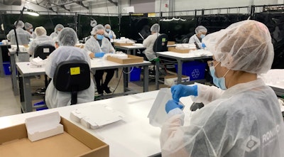 With time of the essence, Rondo-Pak employees produced a quarter of a million complicated cartons in a week and a half, by hand.