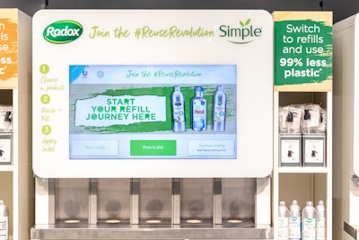 A touch-free refill-on-the-go machine for Radox shower gel allows users to refill a reusable bottle in store.