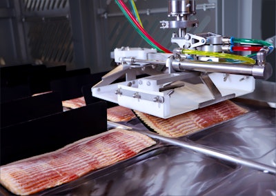 The Harrier Bacon Draft Loading System from JLS Automation loads drafts of bacon into thermoform packaging.