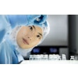 An employee is checking pharma containment solutions. Schott Pharma produces around 13 billion products per year.