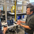 Zenni Director of Distribution and Facilities Simon Goh (right), talks about the deployment now underway with OSARO’s Bryan Yong, a Senior Solutions Engineer at the AI robotics company's San Francisco Robot Lab.