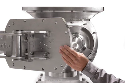 Without tools, cleaning crews can quickly open the Unibloc clean-out-of-place (COP) pump cover and swing it aside.