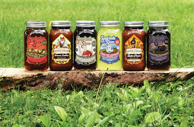 Mason jars are the typical package of choice for moonshine, shown here with various products from the distillery.