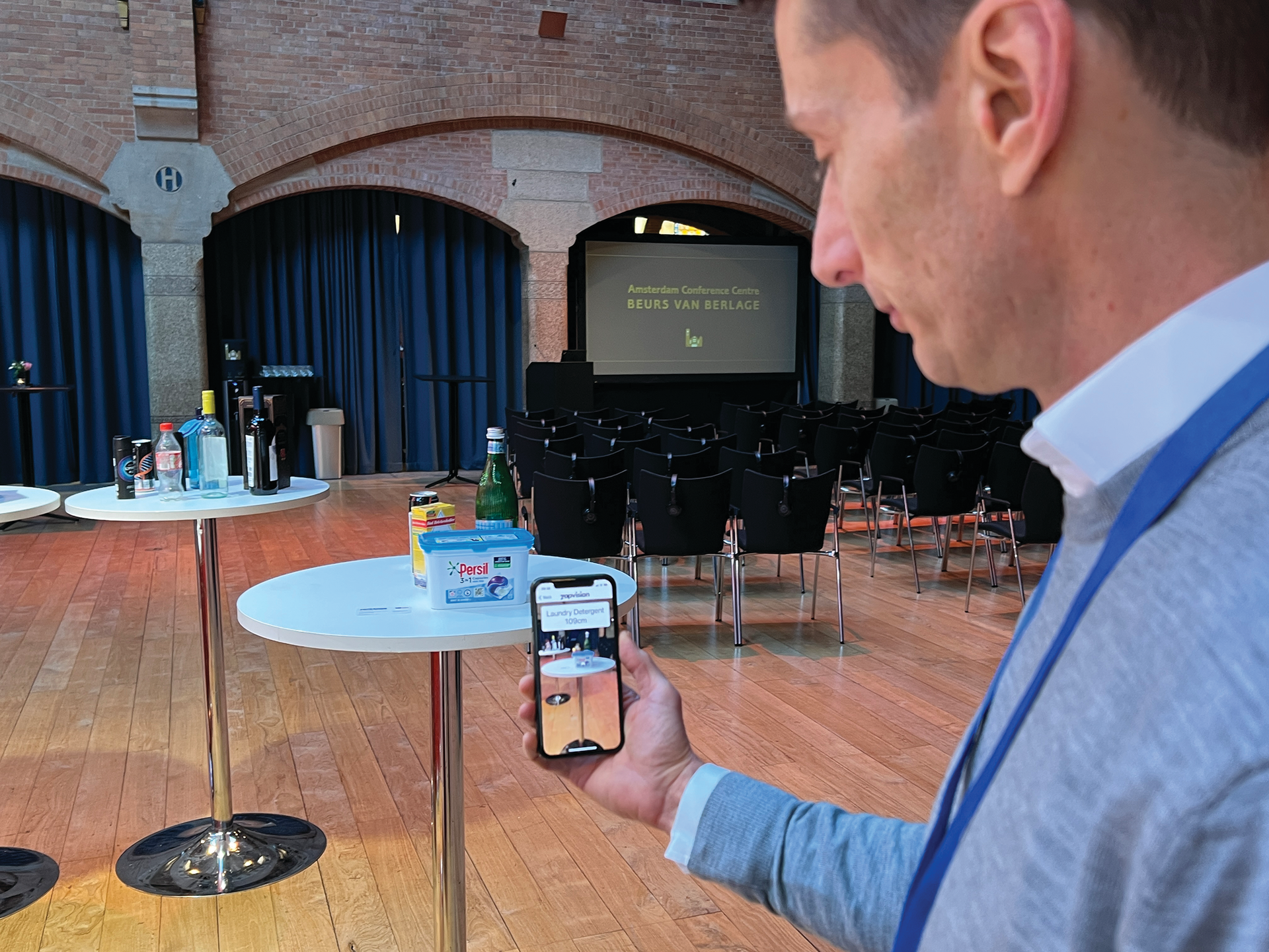 Stahel demonstrates Zapvision at his booth at AIPIA. The system allows a smartphone to read an on-pack QR code at a distance. For a user with sight limitation, more information becomes available on the screen&mdash;in large text or with audio&mdash;as he or she moves closer to a product on the shelf.