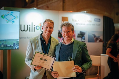 Tom Quinten (left) with anti-counterfeiting specialist Ennoventure receives recognition from Alex Orchard with home health brand owner Haleon. Orchard suggests smart packaging providers present entire ‘pre-connected’ ecosystems, rather than disparate, piecemeal parts of a total active or intelligent packaging solution.