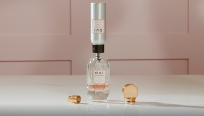 A clever dispensing applicator on the aluminum bottle refills for O.U.i.’s eaux de parfum product ensures product is transferred to the reusable glass package cleanly and easily, without product waste.
