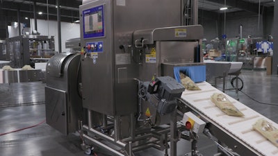 The X36 is an in-line system with input and output conveyors. The bags are filled before running through the X-ray, and then travel to be cased.