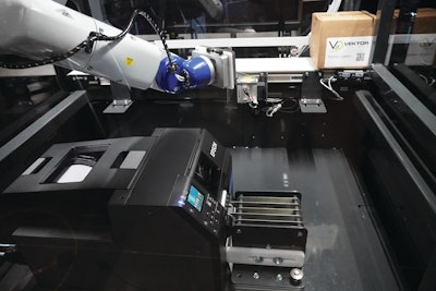 Epson VT6L All-in-One 6-Axis Robot and Epson ColorWorks CW-C6000P Color Inkjet Label Printer automation solution prints and applies labels.