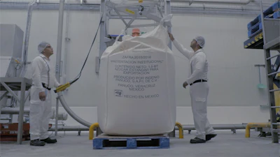 The process of converting to a liquid product begins with the discharge of the large bags of granulated sugar.