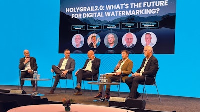 One of the “godfathers” of Europe’s HolyGrail, Gian De Belder (second from right), technical director, packaging sustainability at P&G, led a panel on the future of digital marking to help material recovery facilities (MRFs) identify and properly sort packaging. While HolyGrail 1.0 served as a proof-of-concept for digital watermarks and digital product passports (DPP), HolyGrail 2.0 is a full supply chain assessment of how the tech can enable better sorting, higher-quality material, and better recycling rates as part of a circular economy. Powered by the Alliance to End Plastic Waste and the European Brands Association (AIM), HolyGrail 2.0 continues to be an R&D program where the objective is to increase the technological readiness up to a metric where visual sortation machinery and software are commercially available. “We are now in the last trial phases of this R&D program where the brand owners and retailers have been putting digital watermark-enhanced products into the marketplace in Germany, France, and Denmark, and we’re now in the process of the real industrial test, which means that some of the existing NIR (near infrared) readers that we built to support the first trial phases will be moved into industrial sites,” De Belder reports. The core standard specification for the Digital Product Passport was ratified by the EU on December 12, 2023, just a few weeks after AIPIA.