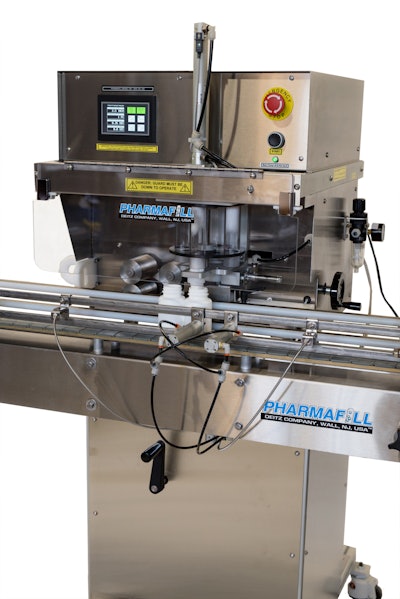 The Pharmafill CS1-C cotton inserter from Deitz Company automatically inserting cotton into bottles.