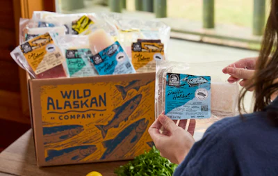 To convey the feeling of Alaska, the design team incorporated the Alaska State colors of yellow/gold and blue, as well as used an illustration of a sockeye on the box. Photo courtesy of Wild Alaskan Company.