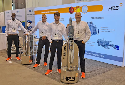 HRS heat exchanger technology team at industrial trade show with equipment