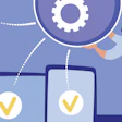 Person configuring digital workflow across multiple devices with verification checkmarks