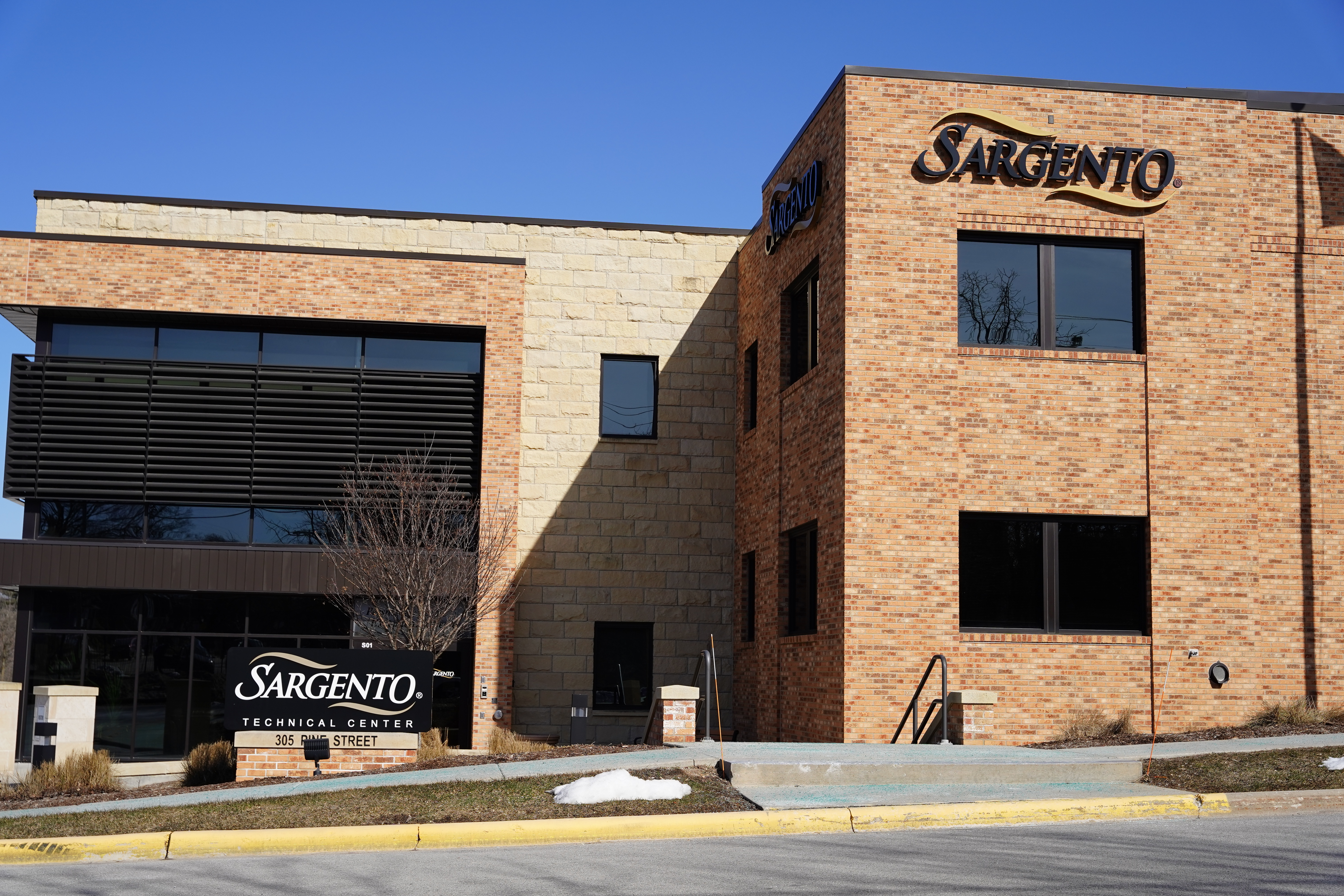 Sargento Technical Center building with brick facade on sunny day