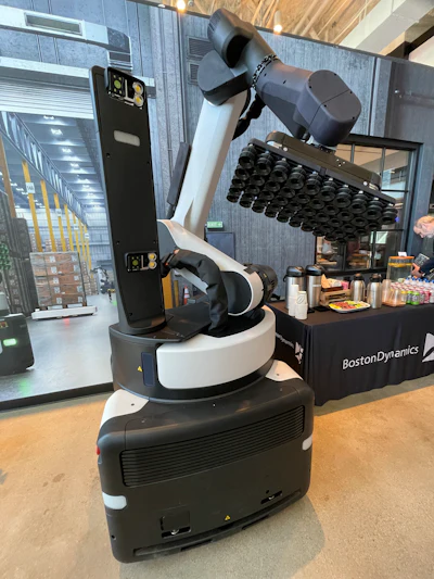 Boston Dynamics robotic arm with multi-jointed design at technology exhibition