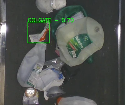 Glacier&rsquo;s AI system identifies a Colgate toothpaste tube on a Material Recovery Facility (MRF) conveyor line. The system uses optical and material recognition to distinguish HDPE tubes from other plastics, verifying how often they are captured in the recycling stream.