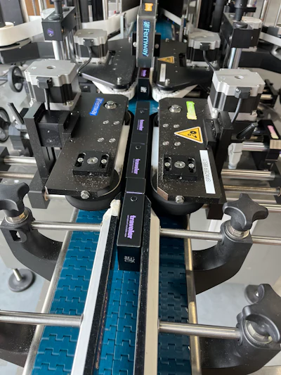 The stainless steel, split-belt conveyor system provides precise control for consistent label placement.