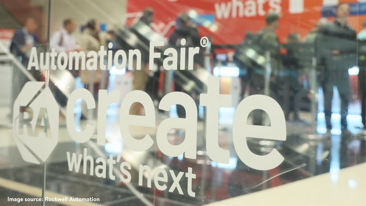 Rockwell Automation Fair glass sign with 'create' logo and event branding