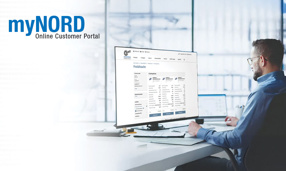 Professional working at desk viewing myNORD online customer portal dashboard