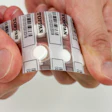Samples of push-through blister packs with brittle lidding material.