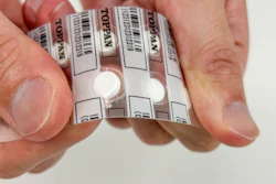 Samples of push-through blister packs with brittle lidding material.