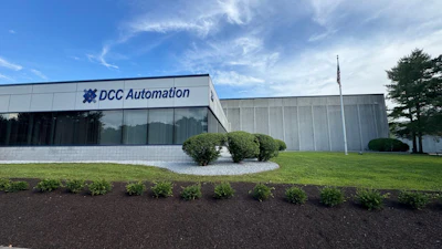 DCC Automation corporate building with landscaped grounds and blue sky
