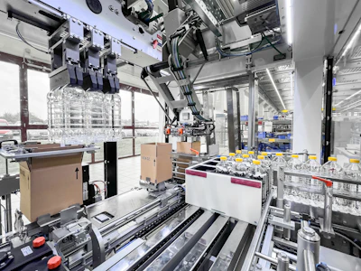 Pine-Glo’s new robotic case-packing system erects, fills, and seals cases in one cell, replacing manual labor while enabling fast, flexible changeovers across multiple product formats.
