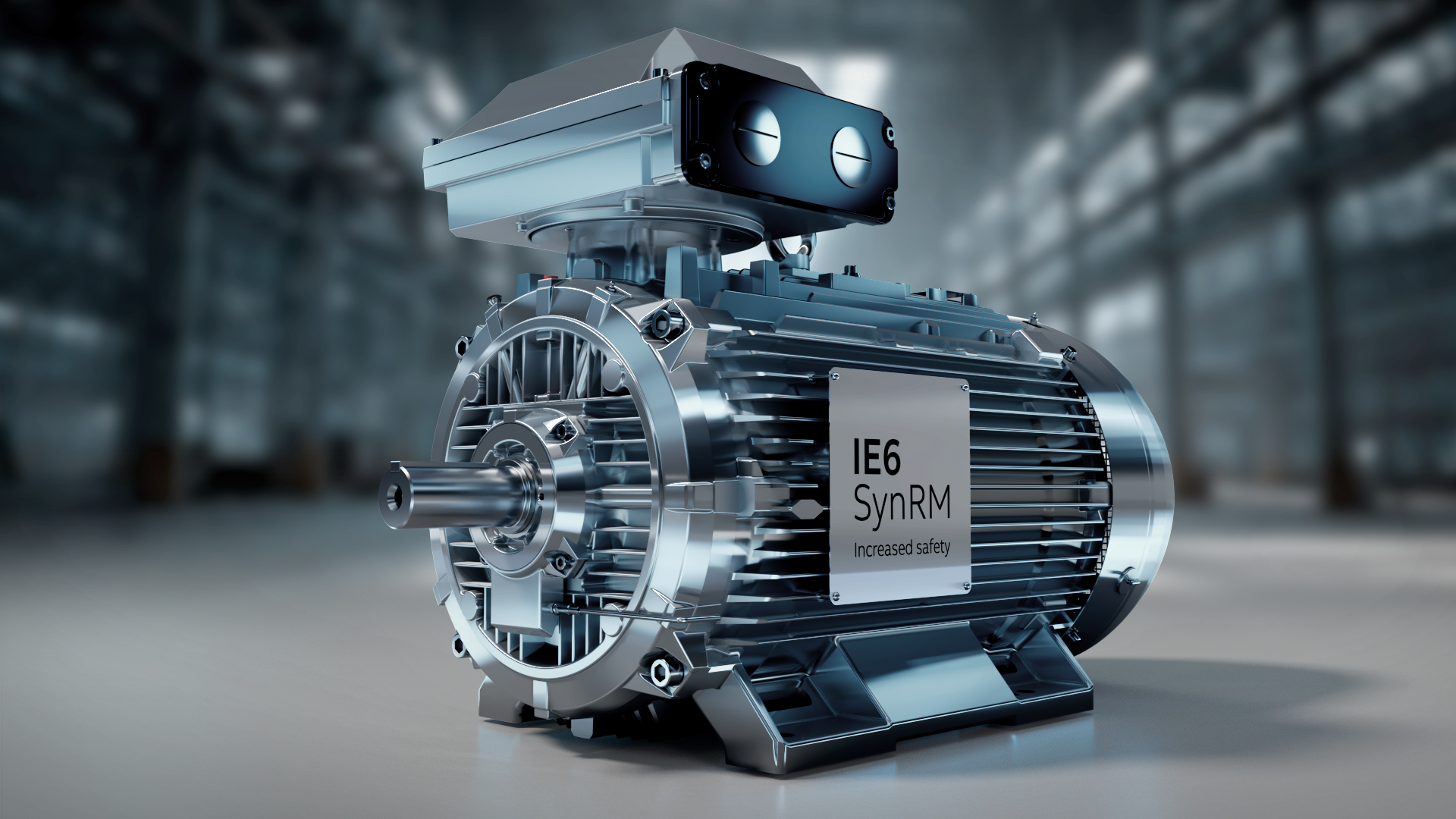 IE6 SynRM industrial electric motor with dual cooling fans in factory setting