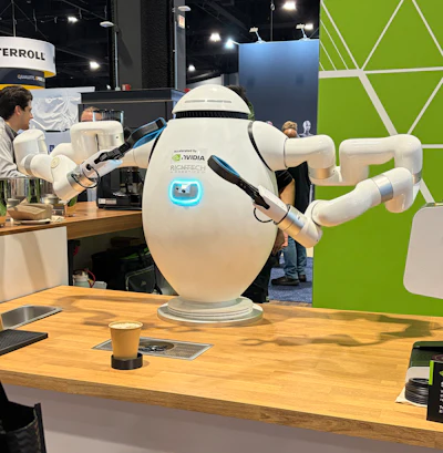 Richtech Robotics’ ADAM, a two-armed barista accelerated by NVIDIA, serves coffee at the Humanoid Robot Pavilion during Automate 2026 in Chicago.