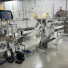Apace’s bottle labeling line includes equipment from NJM Packaging.