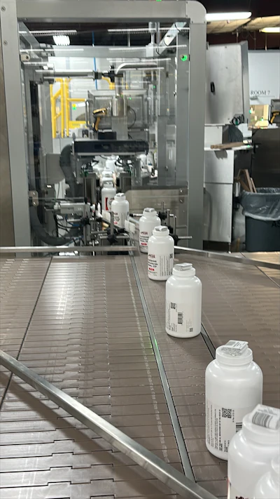After capped and topserted bottles exit the line, they are tracked via Antares Vision’s Omnivision platform.