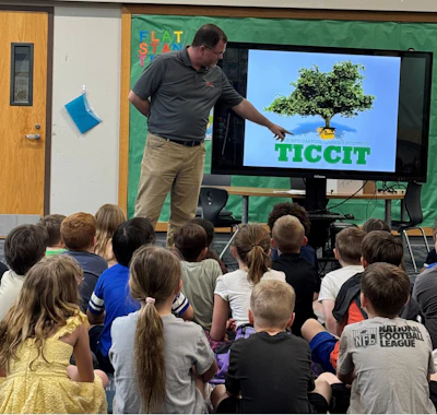 Colbert's Todd Douthit presents the program to elementary students