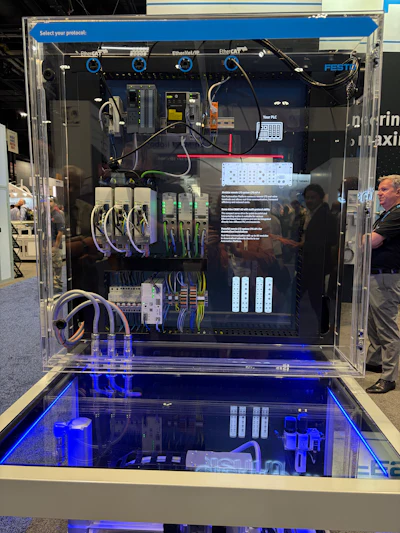 A Festo demonstration lets visitors select a fieldbus protocol, EtherCAT, PROFINET, or EtherNet/IP, and connect it to different PLC brands, illustrating the multi-protocol integration behind the company’s automation platform.