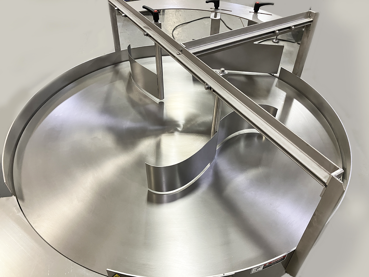 Stainless steel industrial mixing tank with internal paddle agitator and overhead mechanical components