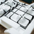 Molded EPS transport packaging, engineered with custom cavities to cushion and immobilize a product in transit. Packaging of this type is no longer on the U.S. Plastics Pact's Problematic and Unnecessary Materials List.