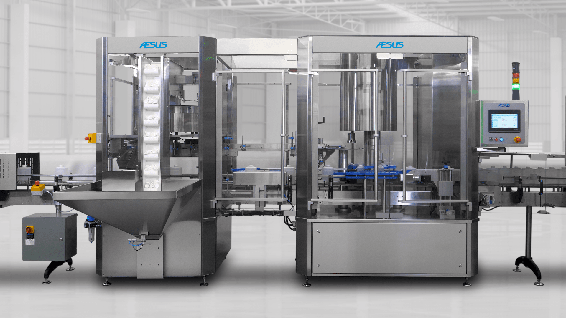 ASUS industrial packaging and filling machinery system in a factory environment with control panel